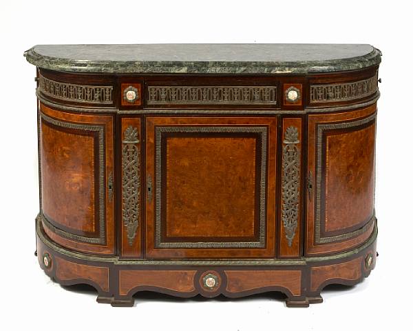 Appraisal: An English mahogany and burlwood bronze mounted and marble topped