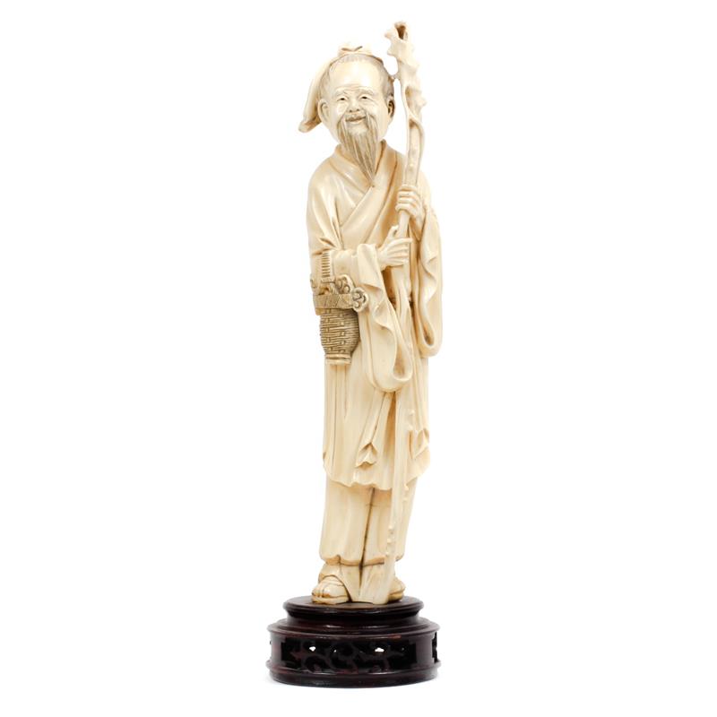 Appraisal: Large Chinese carved ivory figure of hermit with walking stick