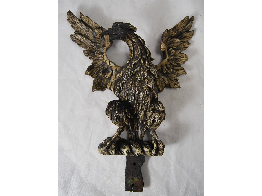 Appraisal: A th century Black Forest carved wood spread eagle crest