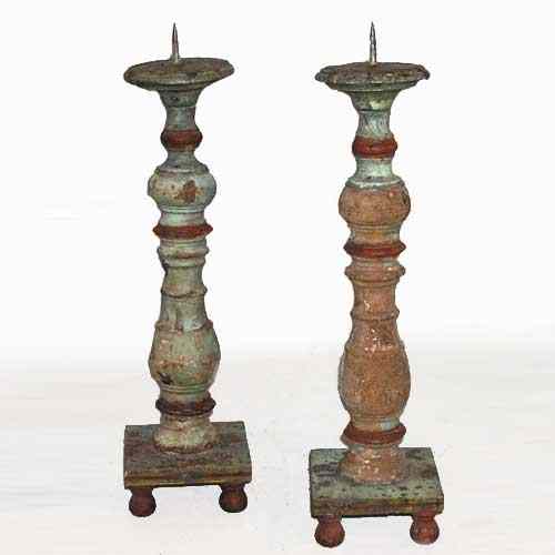 Appraisal: A Pair of Indo-Portuguese Painted Teak Pricket Candlesticks circa each