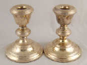 Appraisal: A pair of modern silver candle sticks hallmarked Birmingham Millenium