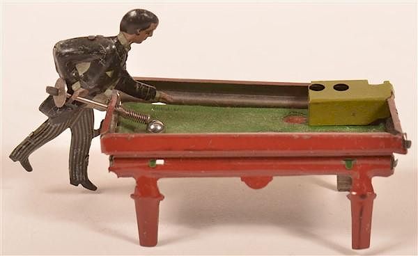 Appraisal: German Tin Lithograph Billiard Player Penny Toy German Tin Lithograph