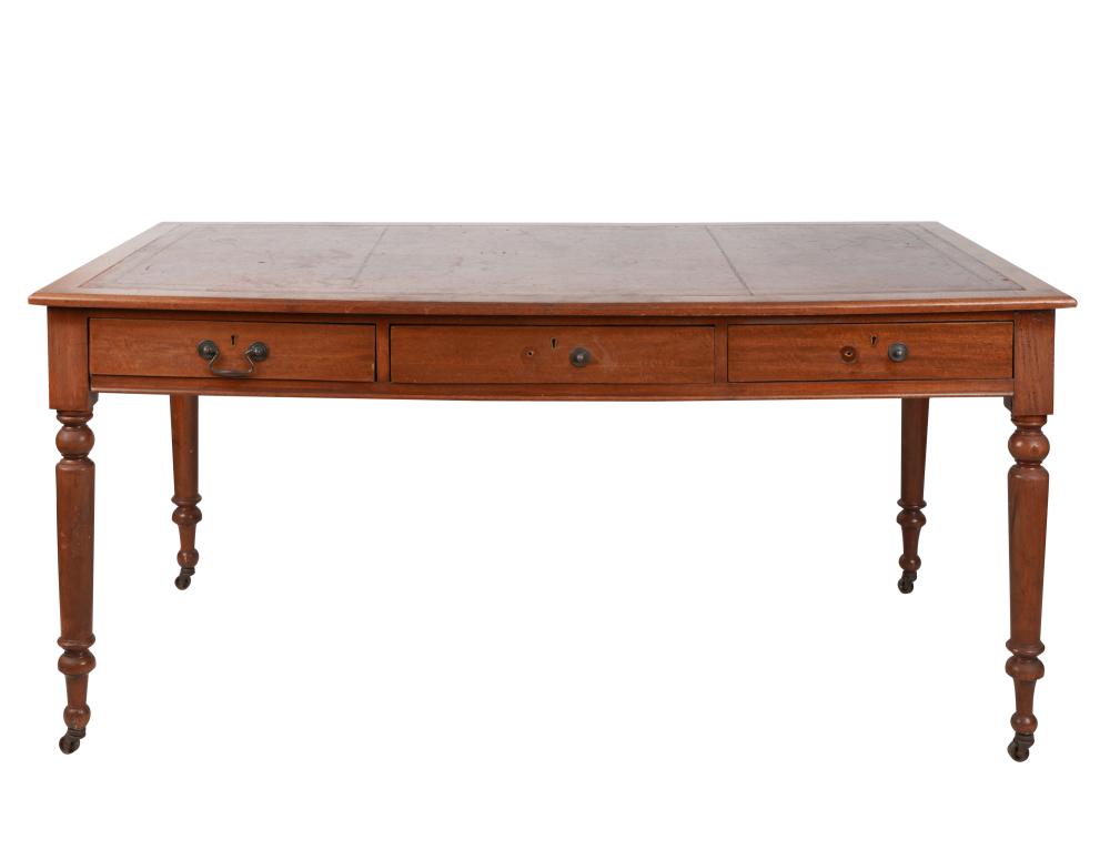 Appraisal: MAHOGANY WRITING TABLEwith leather-inset top over three drawers the turned