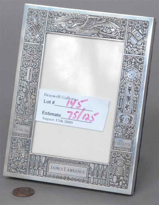 Appraisal: STERLING SILVER FRAME Birth record allover chased design H Troy