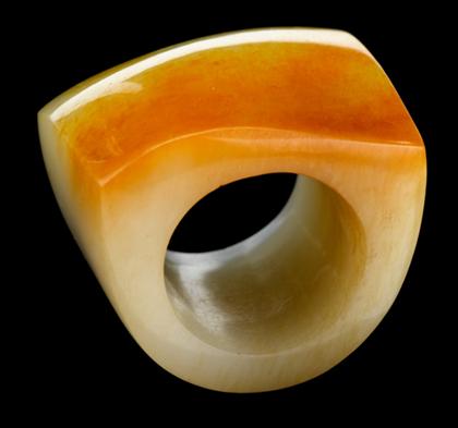 Appraisal: Chinese white and brown skinned jade archers ring th century