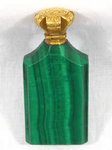 Appraisal: A malachite perfume bottle fitted with a high carat gold