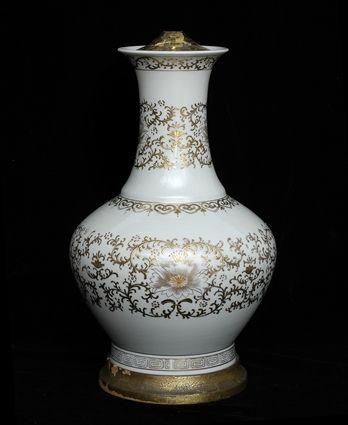 Appraisal: CHINOISERIE GILT-DECORATED IVORY-GLAZED PORCELAIN VASE MOUNTED AS A LAMP With