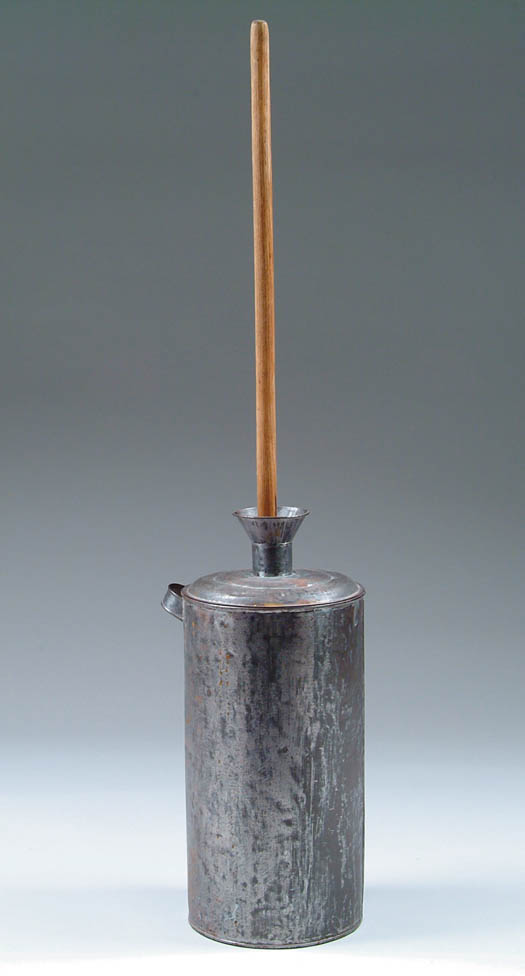 Appraisal: TOLEWARE TALL BUTTER CHURN Canister form with one strap handle