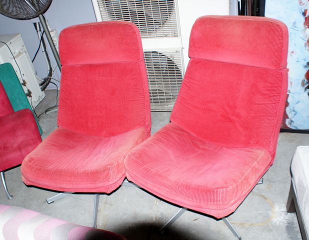 Appraisal: A pair of red fabric upholstered Sebel easy chairs