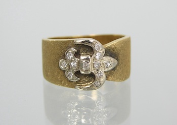 Appraisal: A Fleur-de-Lys Desight Diamond Ring k yellow gold band with