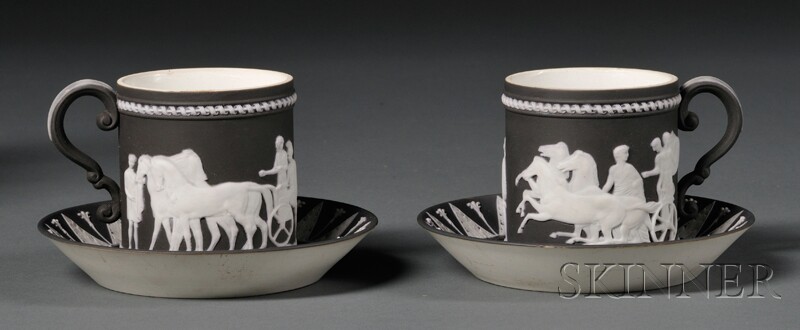 Appraisal: Two Wedgwood Black Jasper Dip Coffee Cans and Saucers England