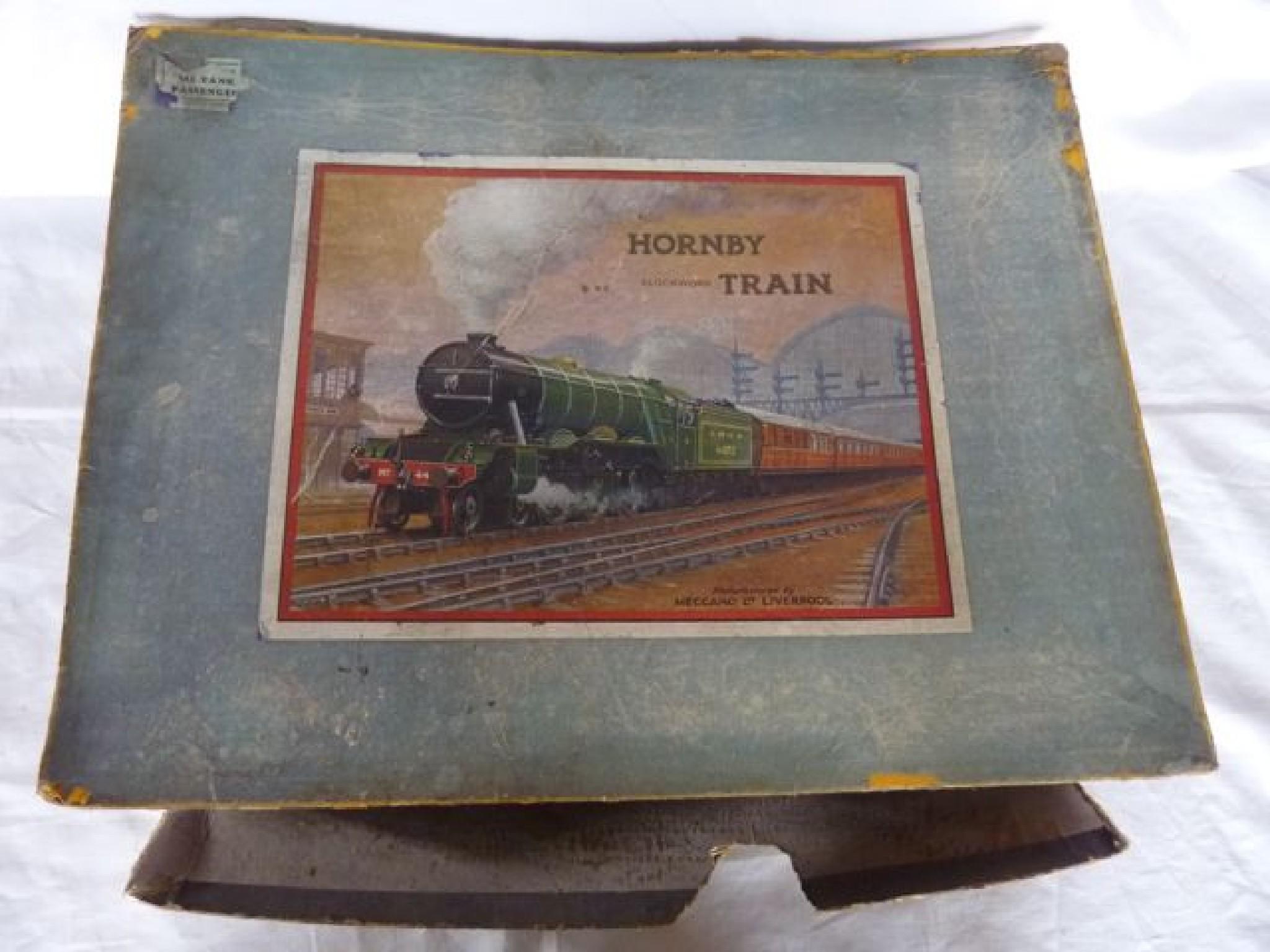 Appraisal: A Hornby OO gauge tin plate railway comprising a Great