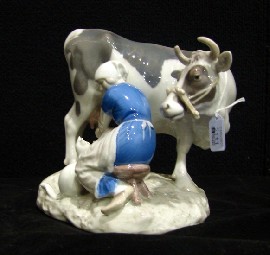 Appraisal: A Bing Grondahl group figure of a farm woman milking