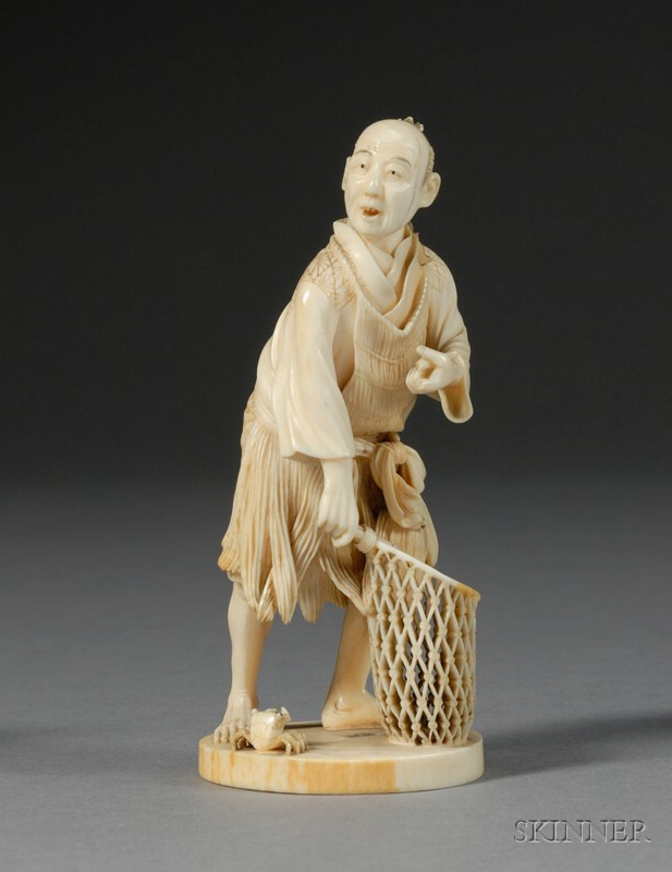 Appraisal: Ivory Carving Japan th century carving of a fisherman with