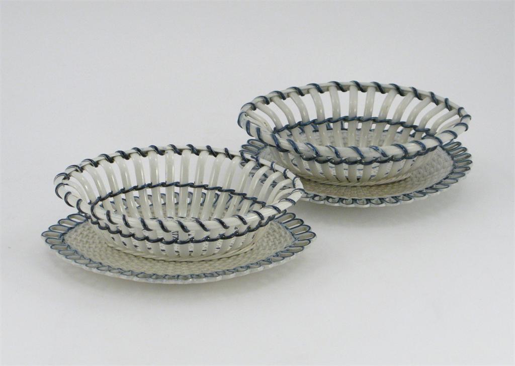 Appraisal: A pair of pearlware baskets and stands