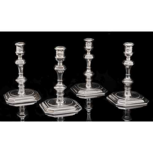 Appraisal: A set of four George I silver candlesticks with banded