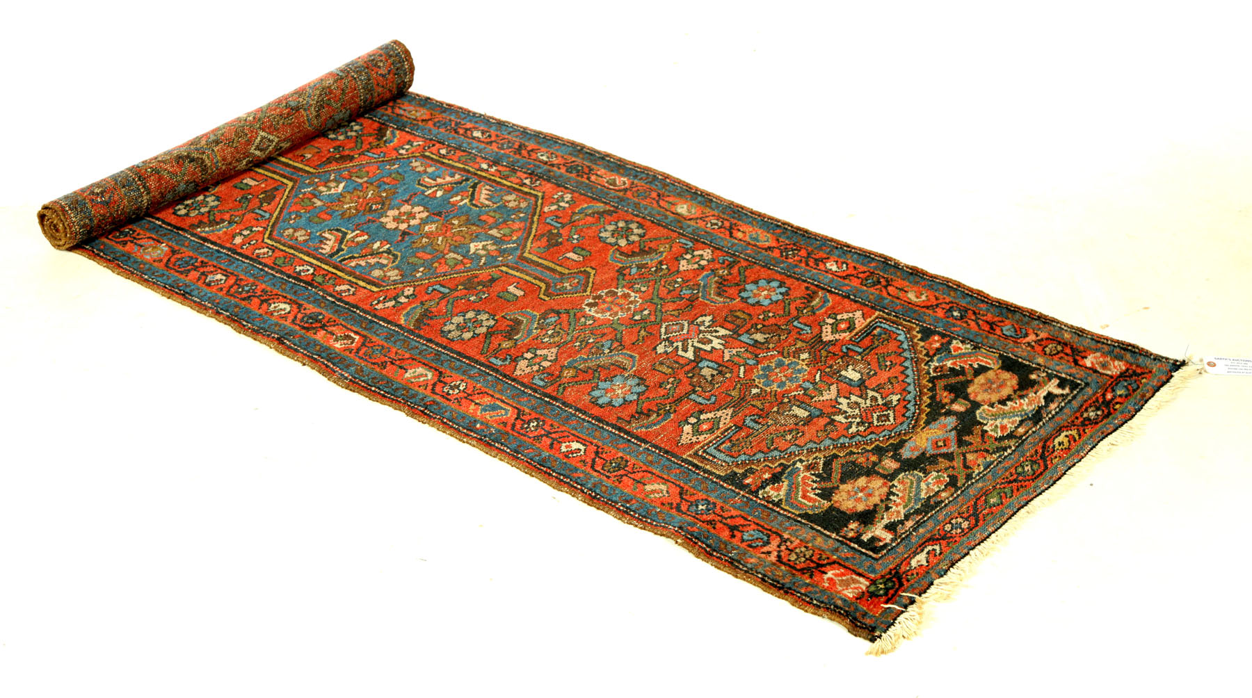 Appraisal: ORIENTAL RUNNER Hamadan Red ground and border black spandrels '