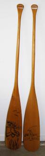 Appraisal: pr of decorated wooden paddles length pr of decorated wooden