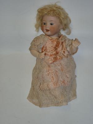 Appraisal: A Porcelanfabrik Mengersgereuth bisque head character girl doll with blue