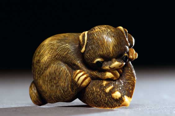 Appraisal: ANTIQUE IVORY NETSUKE Very charming and antique well carved ivory