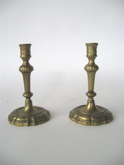 Appraisal: Pair of Queen Anne brass candlesticks Ringed candle cups on