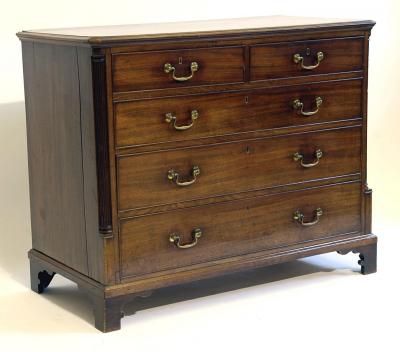 Appraisal: A GEORGE III MAHOGANY CHEST the moulded edged canted top