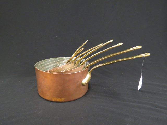 Appraisal: pc Graduated Set of Copper Pots brass handled to diameter