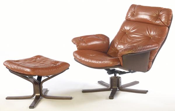 Appraisal: DYRLUND Leather lounge chair and ottoman each on bentwood base