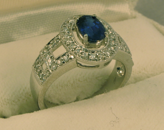 Appraisal: SAPPHIRE DIAMOND AND FOURTEEN KARAT WHITE GOLD RING WITH APPRAISAL