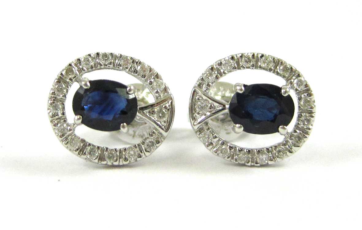 Appraisal: PAIR OF SAPPHIRE AND DIAMOND STUD EARRINGS each k white