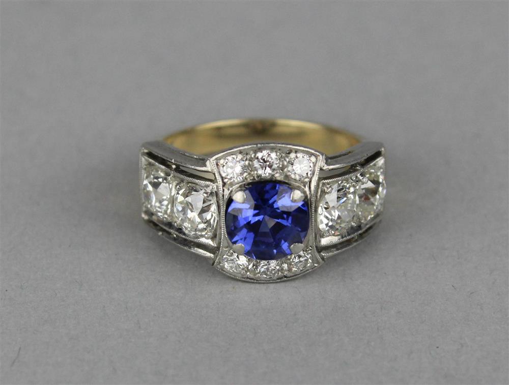 Appraisal: LADY'S DIAMOND AND BLUE COLORED GEMSTONE RING the k yellow