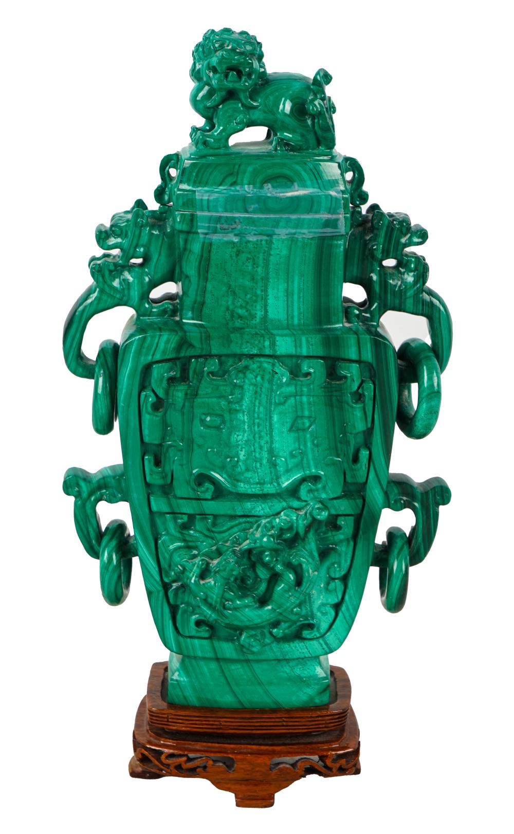 Appraisal: CHINESE CARVED MALACHITE JARwith cover resting on wood base inches