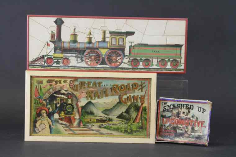 Appraisal: LOT OF TWO EARLY TRAIN ITEMS Both lithographed paper features