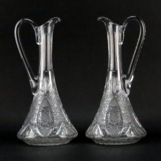 Appraisal: Pair of Vintage Cut Crystal Ewers Unsigned One ewer has