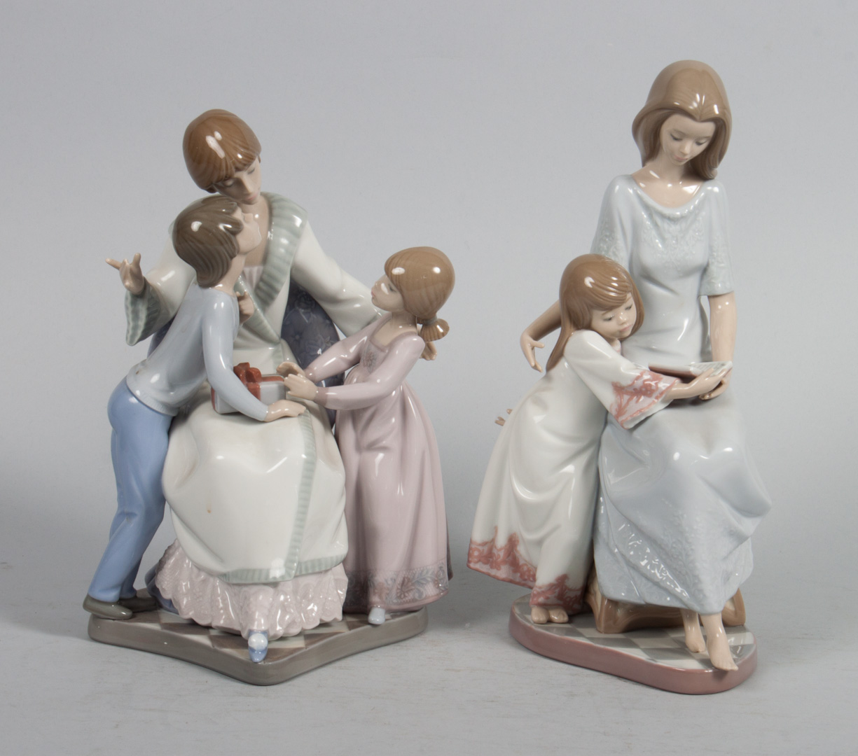 Appraisal: Two Lladro porcelain figural groups Bedtime Story in H and