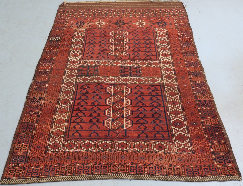 Appraisal: TURKMEN ENSI RUG Middle East th CenturyRed orange navy blue