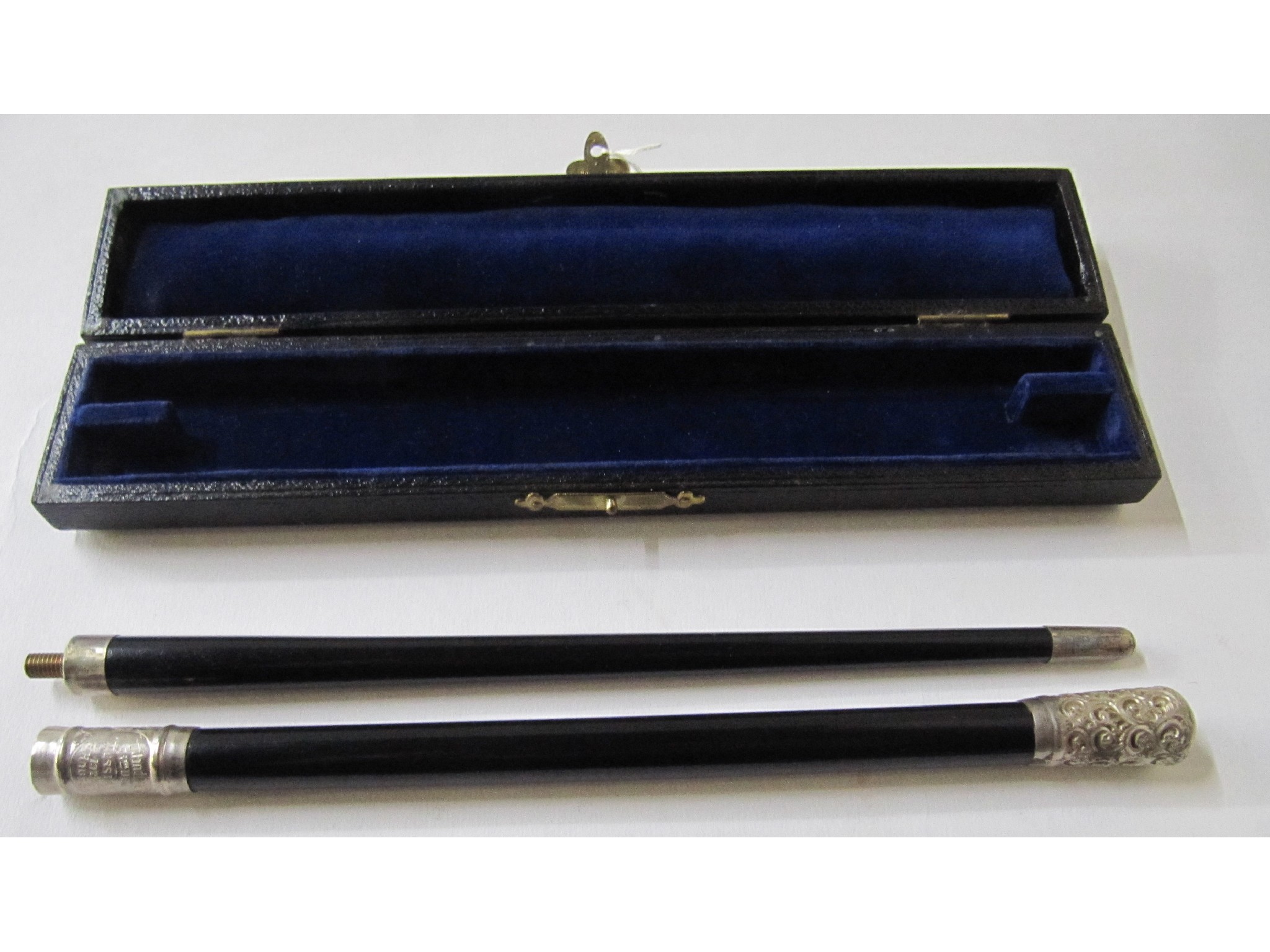 Appraisal: A cased conductor's -part silver mounted baton London