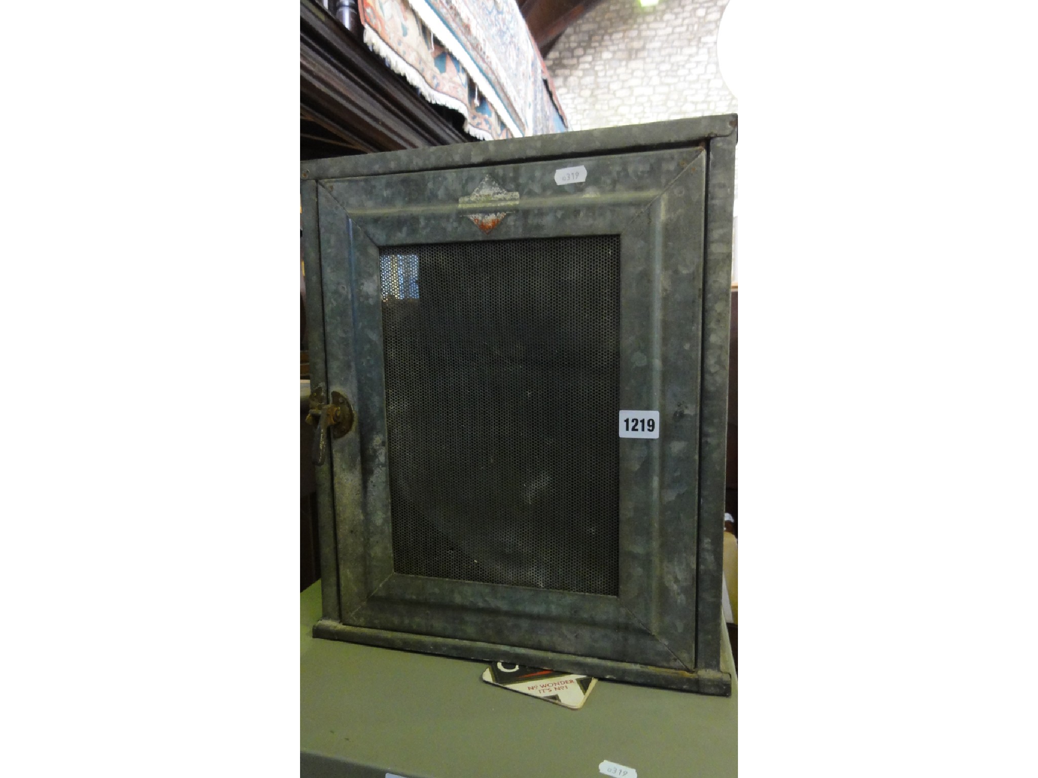 Appraisal: A vintage galvanised hanging meat safe with zinc mesh panels