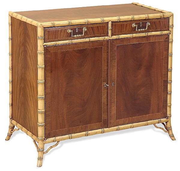 Appraisal: A Sheraton style cabinet with carved bamboo frame Fitted with