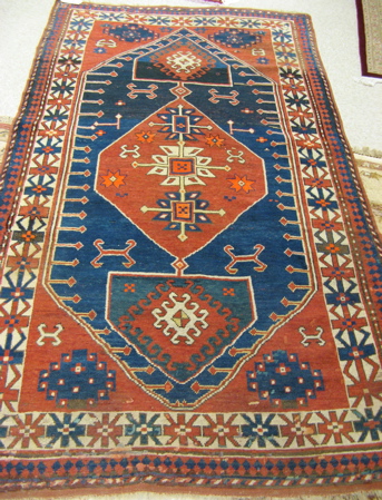 Appraisal: TWO MIDDLE EASTERN TRIBAL AREA RUGS semi-antique Persian tribal overall