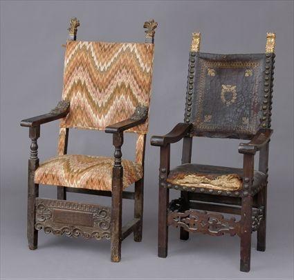 Appraisal: TWO ITALIAN BAROQUE CARVED WALNUT AND PARCEL-GILT ARMCHAIRS With brass-nail