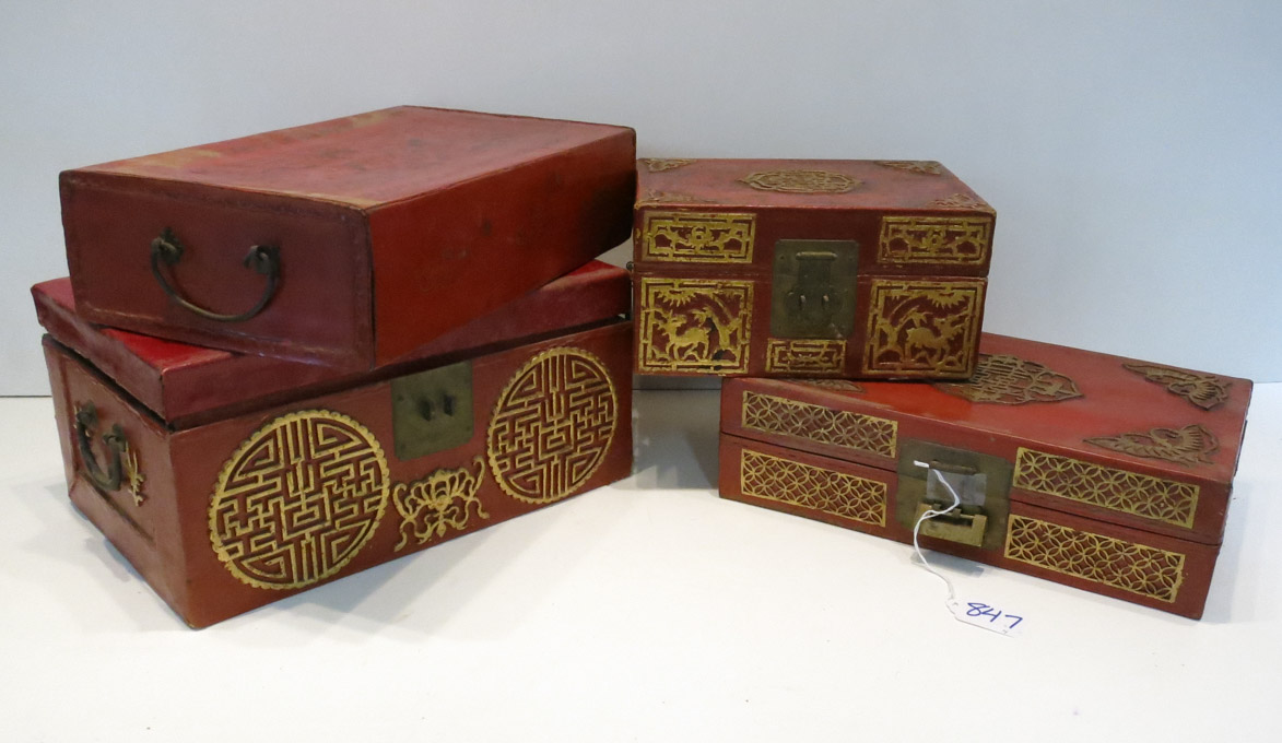 Appraisal: FOUR LEATHER COVERED CHINESE BOXES three are trunk type with