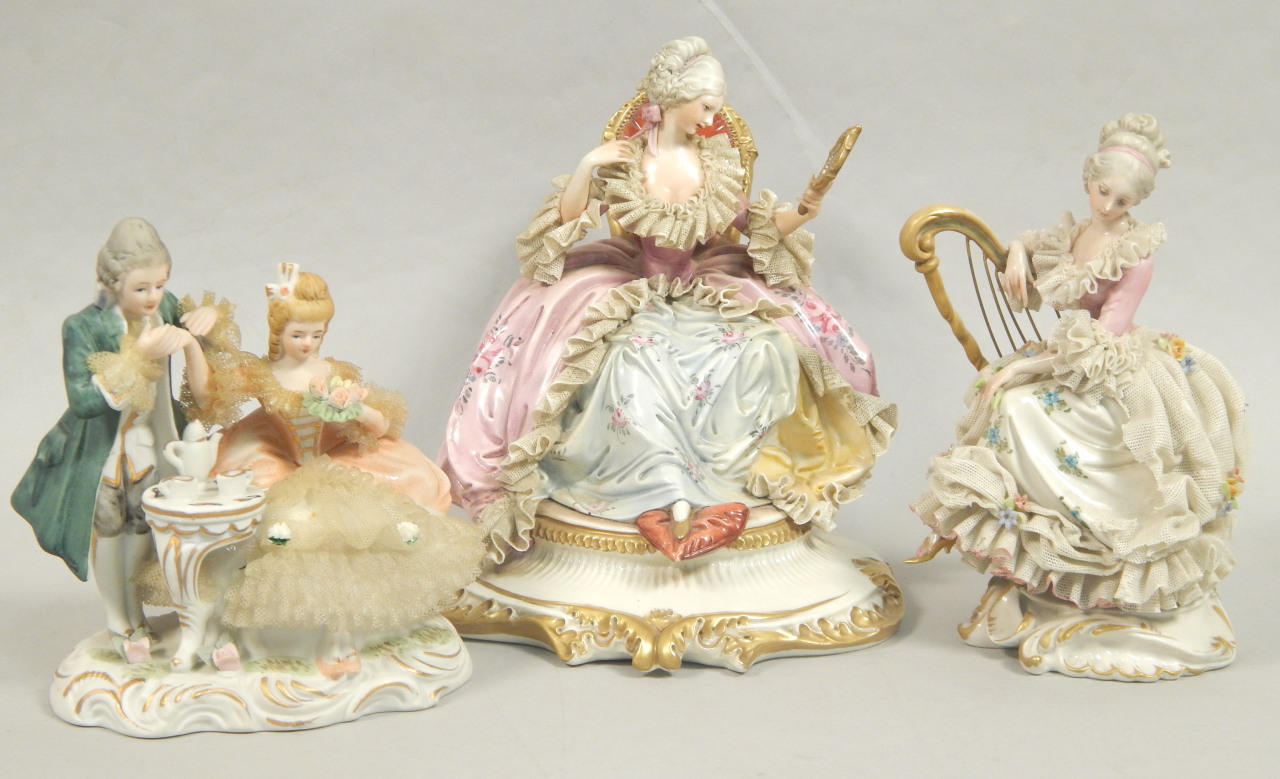 Appraisal: Three Continental porcelain crinoline type figures to include a lady