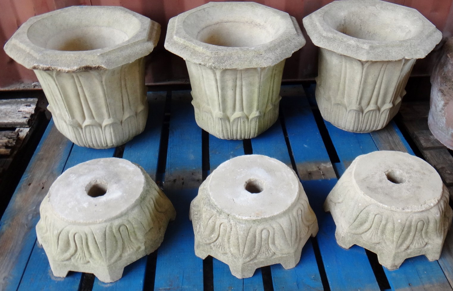 Appraisal: A set of three reconstituted stone planters of stylised tulip