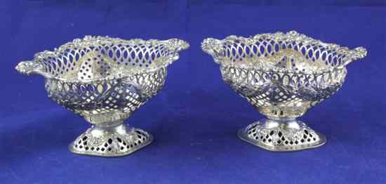 Appraisal: A matched pair of late Victorian pierced silver pedestal bonbon