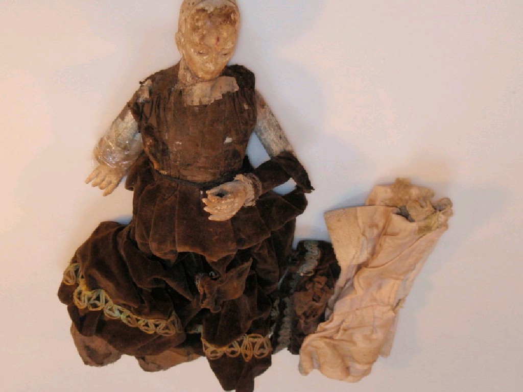 Appraisal: A French thC carved and painted wooden doll cm