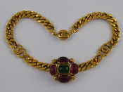 Appraisal: Chanel A gilt metal necklace with green and red stones