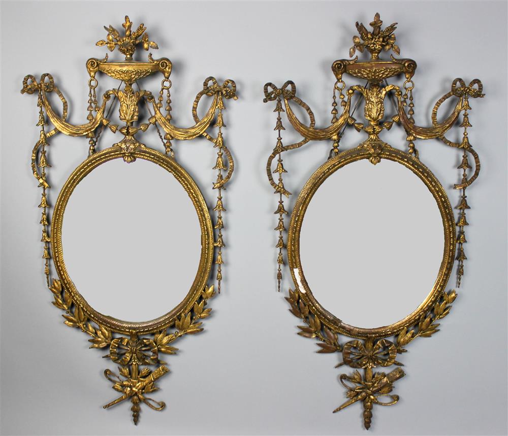 Appraisal: PAIR OF ADAM STYLE GILTWOOD MIRRORS both with a large