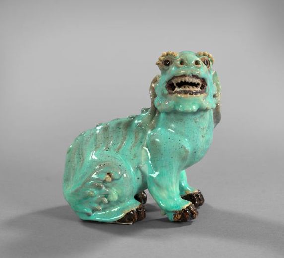 Appraisal: Kuang Hsu Pale Turquoise-Glazed Pottery Figure of a Seated Foo