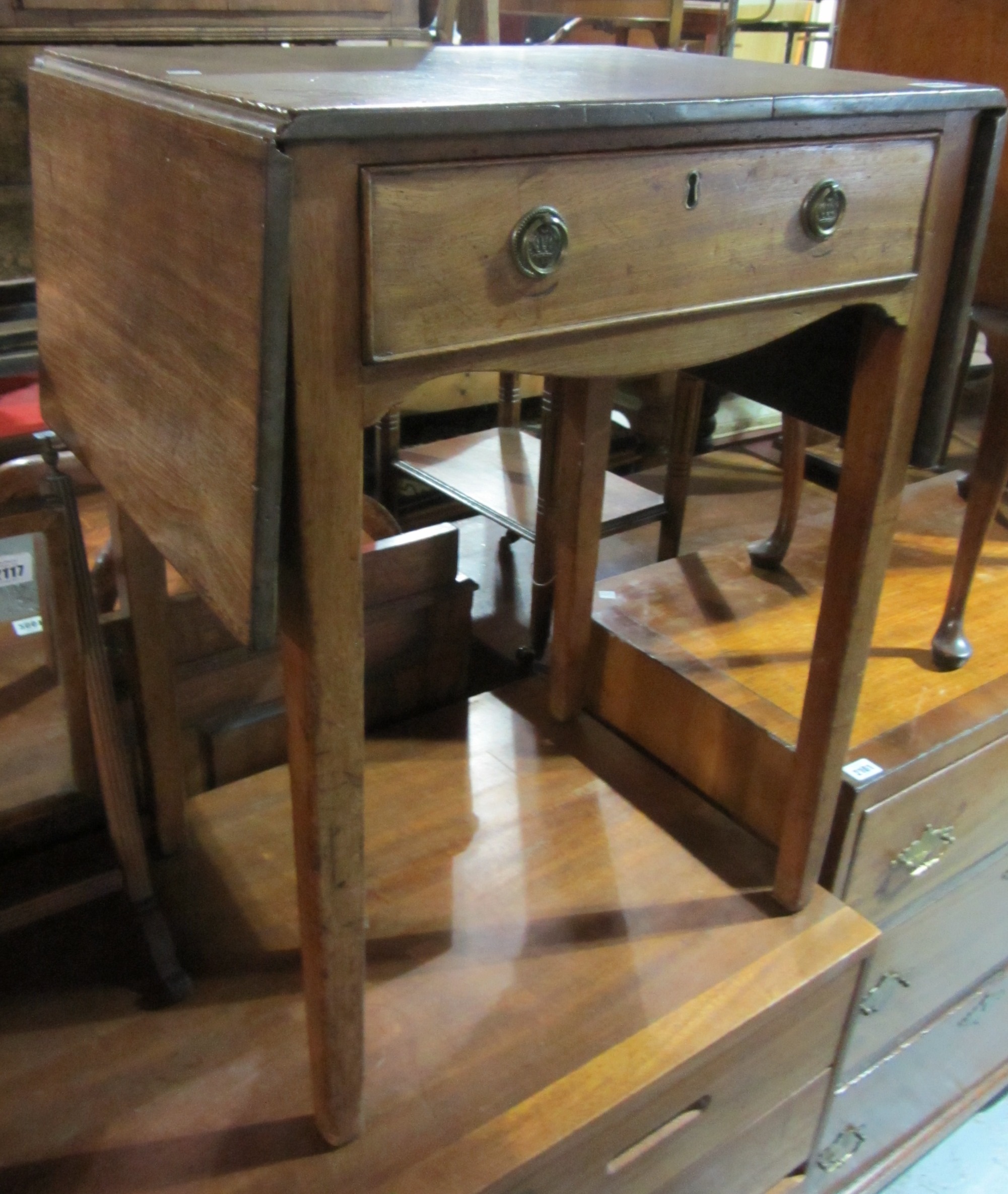 Appraisal: A th century mahogany drop flap occasional table